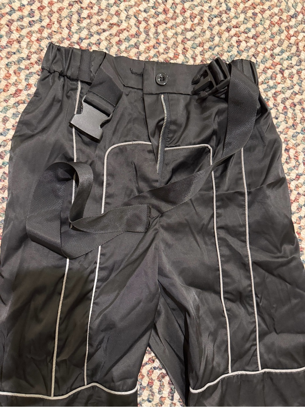 Black jogger pants with reflective detail